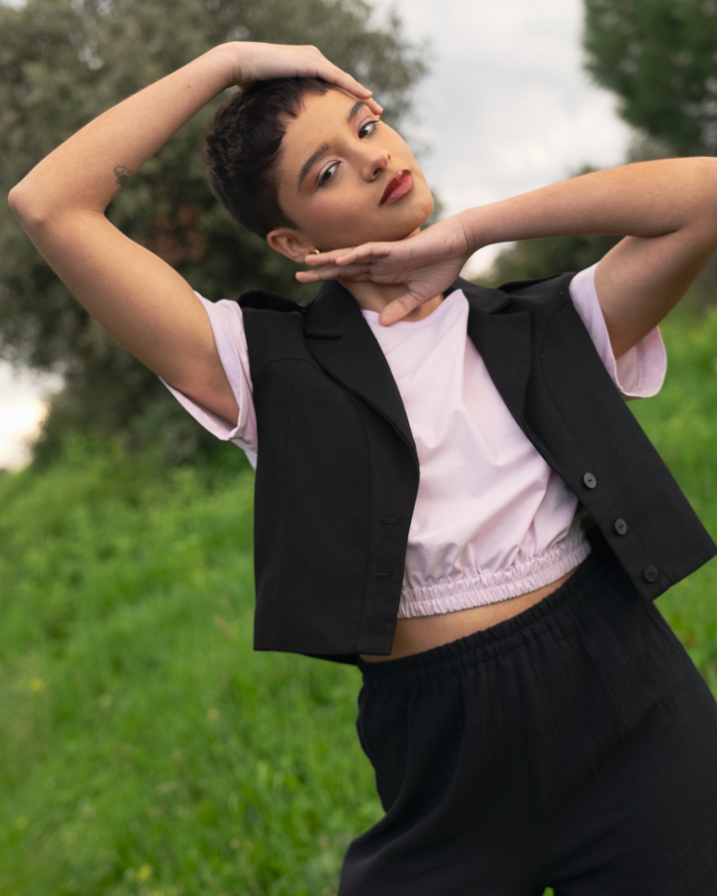 Mauve Cotton Top with Elastic Waist and Tie Detail and Black Cotton Vest with Front Buttons and Shoulder Flaps